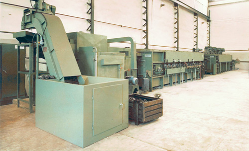 Continuous quench and tempering furnace
